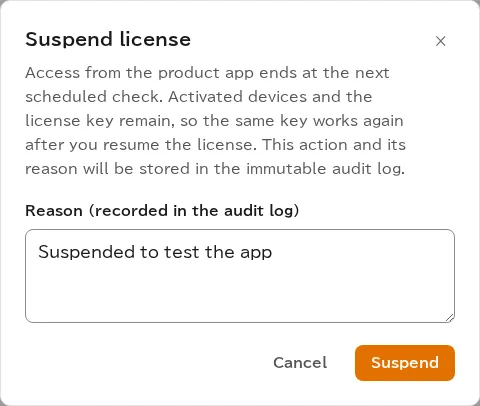 The Suspend license confirmation, explaining that the app stops at its next periodic check and that activated devices and the license key are kept, with a field for the reason and a Suspend button.