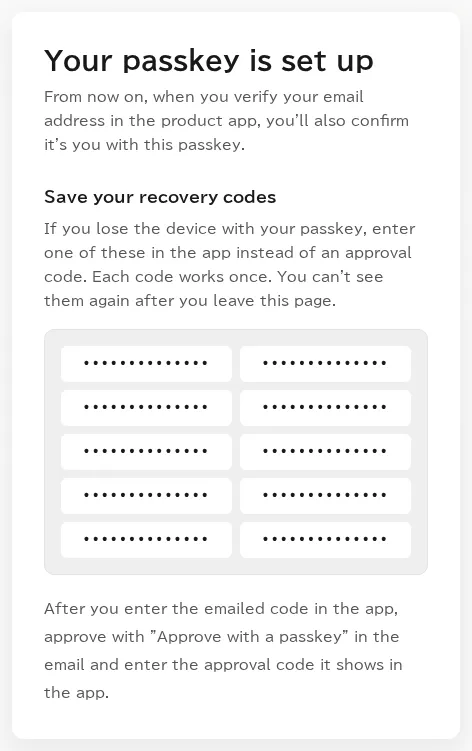 The passkey registered page, showing 10 recovery codes (masked in this image) and how to use them when you verify.